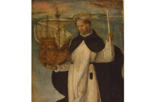 San Telmo representado con cirio y barco