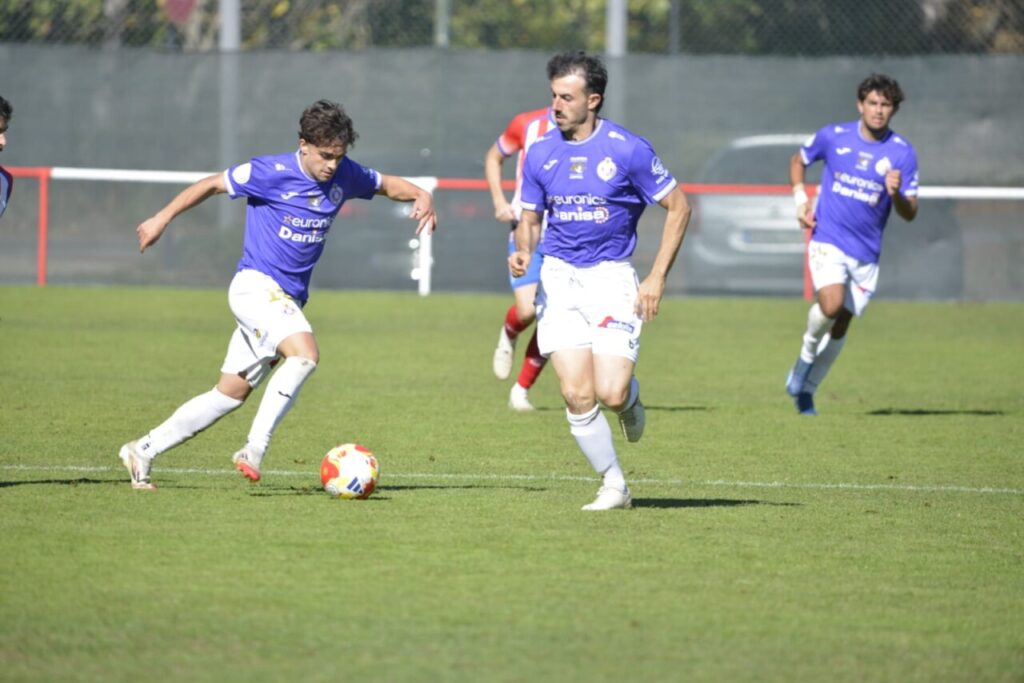 Jugadores del Palencia Cristo Atlético en un partido de fútbol