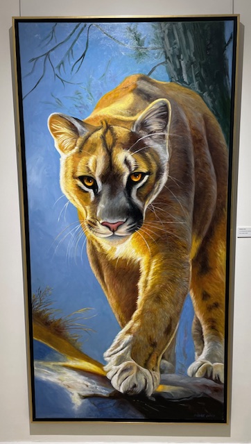 Pintura de un puma en la exposición de artistas palentinos