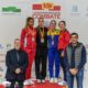 Isabel Nieto en el podio de los Juegos Nacionales de Combate con medalla de plata