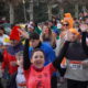 Corredores sonrientes en la San Silvestre 2025 en Palencia