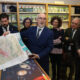 Inauguración de la Casa del Mapa en Palencia con un mapa en primer plano.