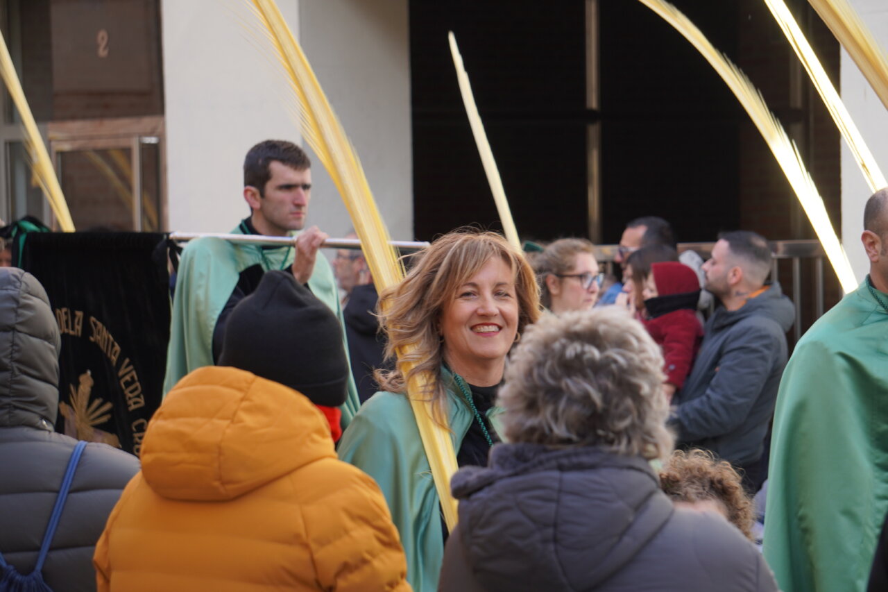 Multitud de personas en la procesión de La Borriquilla en Palencia