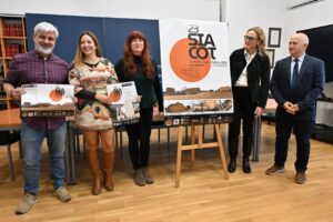 Presentación del seminario SIACOT España 2026 en Palencia con participantes y cartel