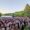 Multitud disfrutando del festival Palencia Sonora en un parque al aire libre