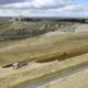 Obras en el tramo Palencia Norte-Amusco con maquinaria y paisaje de fondo