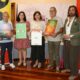 Presentación del concurso de Patatas Bravas en Palencia con participantes y carteles