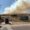 Densa columna de humo de un incendio forestal en Valdeolmillos.