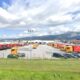 Vista de la base logística de Patinter en Venta de Baños con camiones estacionados