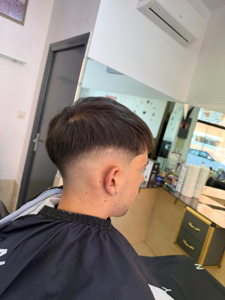 Corte de pelo masculino en la peluquería Morabit en Palencia
